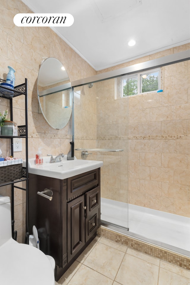 21-12 22nd Dr, New York City, NY 11105 - full bathroom featuring tile walls, a shower stall, vanity, toilet, and crown molding