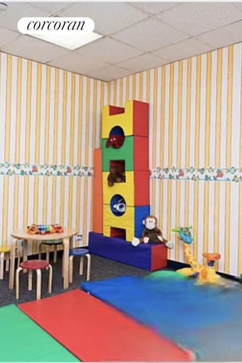 250 E 40th St Unit 17F, New York City, NY 10016 - playroom featuring a paneled ceiling