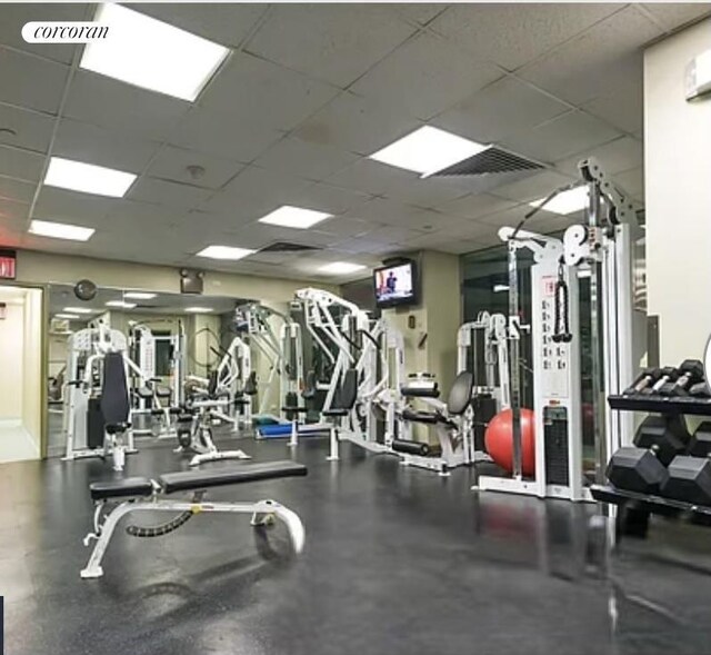 250 E 40th St Unit 17F, New York City, NY 10016 - gym with a paneled ceiling