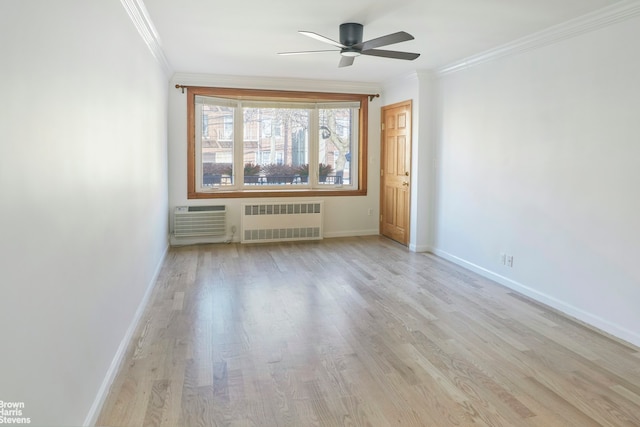 26-08 24th Ave, New York City, NY 11102 - unfurnished room with radiator, a ceiling fan, wood finished floors, ornamental molding, and baseboards