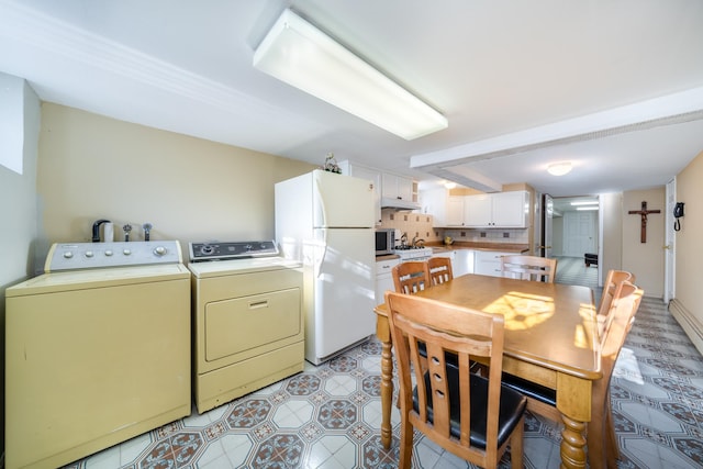 dining area featuring washing machine and dryer