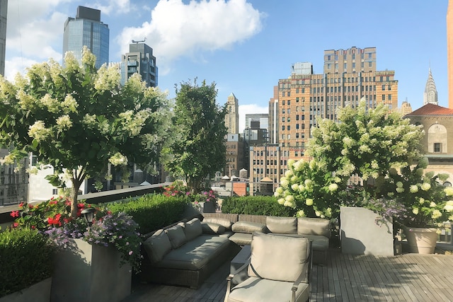 45 E 30th St Phb, Phb, New York City, NY 10016 - wooden terrace featuring a view of skyline and an outdoor hangout area
