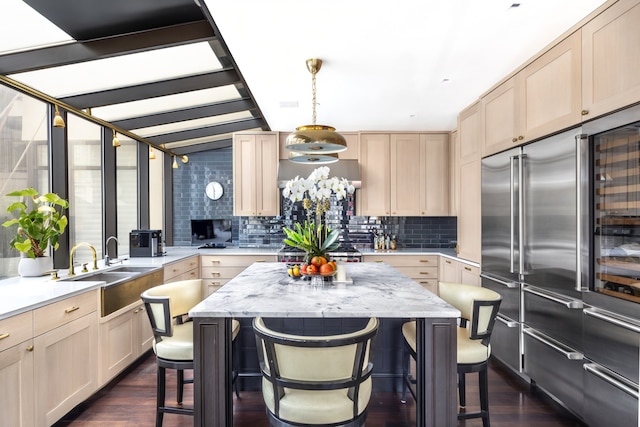 45 E 30th St Phb, Phb, New York City, NY 10016 - kitchen with high end refrigerator, dark wood finished floors, a kitchen breakfast bar, and backsplash