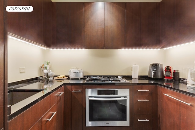 40 Broad St Unit 18C, New York City, NY 10004 - kitchen featuring stainless steel appliances and modern cabinets