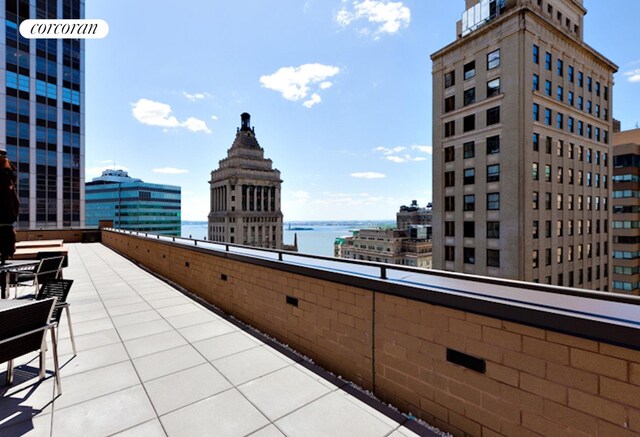 40 Broad St Unit 18C, New York City, NY 10004 - view of patio / terrace featuring a water view and a city view