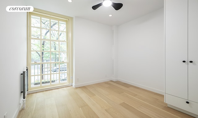 509 E 77th St Unit 1P, New York City, NY 10075 - unfurnished bedroom featuring light wood-type flooring, recessed lighting, and baseboards