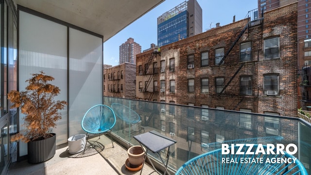 302 E 96th St Unit 502, New York City, NY 10128 - balcony with a view of city