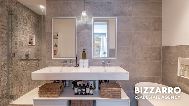 302 E 96th St Unit 502, New York City, NY 10128 - bathroom featuring tile walls and a stall shower