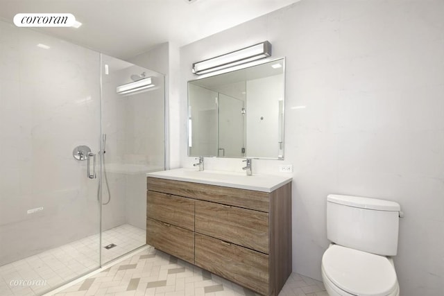 23 W 116th St Unit 11A, New York City, NY 10026 - bathroom with a stall shower, double vanity, and toilet