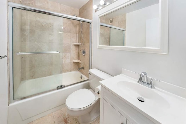 full bathroom with toilet, vanity, and combined bath / shower with glass door