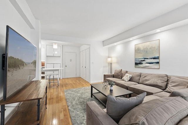 310 E 49th St Unit 4-D, New York City, NY 10017 - living area with light wood finished floors and recessed lighting