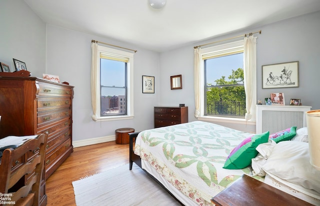 1825 Riverside Dr Unit 6B, New York City, NY 10034 - bedroom with wood finished floors and baseboards