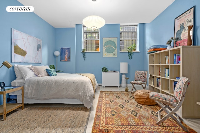 bedroom with tile patterned floors