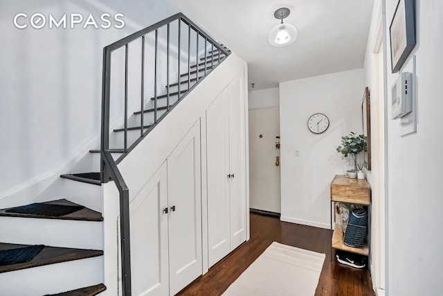 255 W 95th St Unit 6D, New York City, NY 10025 - stairway featuring wood finished floors and baseboards