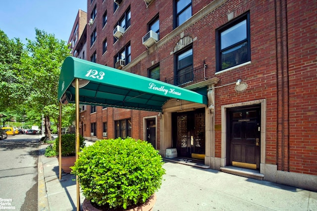 123 E 37th St Unit 6B, New York City, NY 10016 - view of building exterior featuring cooling unit