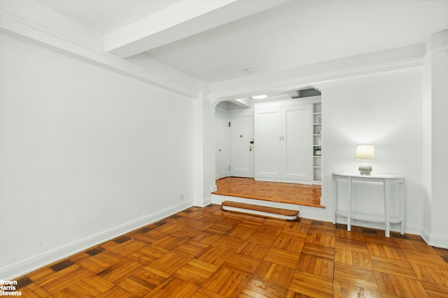 123 E 37th St Unit 6B, New York City, NY 10016 - foyer featuring baseboards and arched walkways