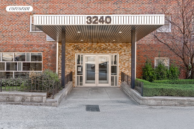 3240 Riverdale Ave Unit 6J, New York City, NY 10463 - entrance to property featuring french doors and brick siding