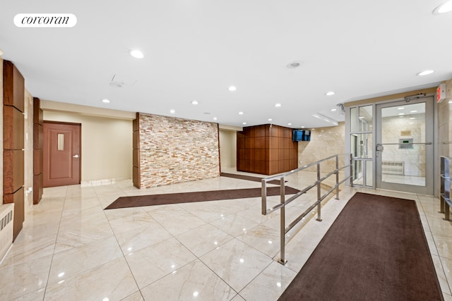 3240 Riverdale Ave Unit 6J, New York City, NY 10463 - building lobby with recessed lighting