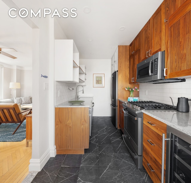 39 Plaza St W Unit 7C, New York City, NY 11217 - kitchen featuring stainless steel appliances, beverage cooler, open shelves, dark marble finish floors, and tasteful backsplash