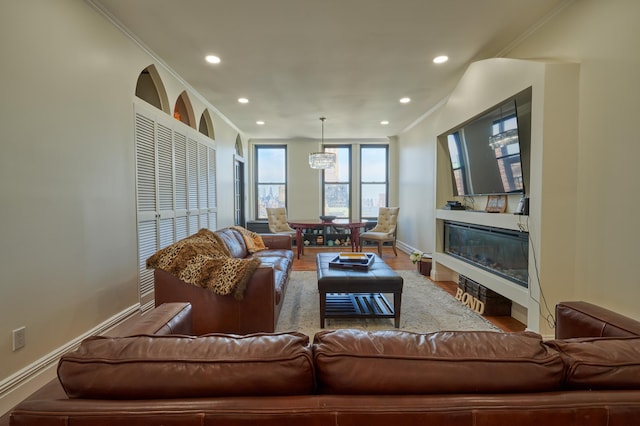 75 Livingston St Unit 28-A, New York City, NY 11201 - living room with recessed lighting, wood finished floors, and a glass covered fireplace
