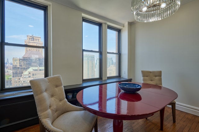 75 Livingston St Unit 28-A, New York City, NY 11201 - dining room featuring ornamental molding, healthy amount of natural light, wood-type flooring, a chandelier, and a view of city