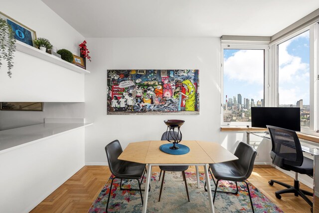 524 E 72nd St Unit 36B, New York City, NY 10021 - dining space with baseboards and an office area