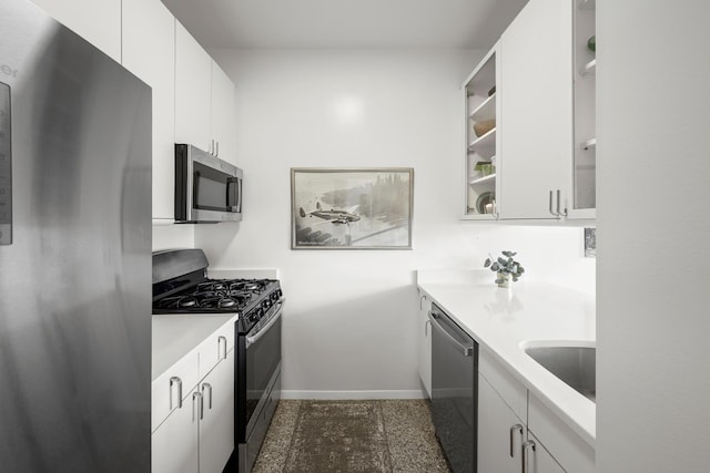 524 E 72nd St Unit 36B, New York City, NY 10021 - kitchen featuring stainless steel appliances, baseboards, light countertops, glass insert cabinets, and a sink