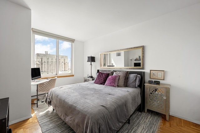 524 E 72nd St Unit 36B, New York City, NY 10021 - bedroom featuring baseboards