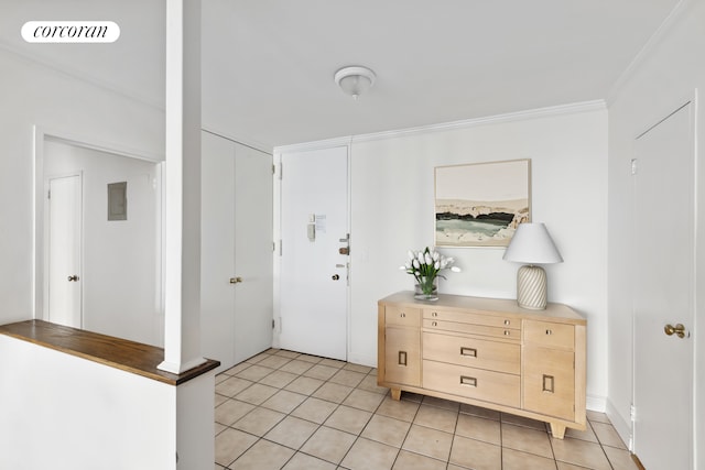 500 E 83rd St Unit 3D, New York City, NY 10028 - entrance foyer featuring light tile patterned floors and crown molding