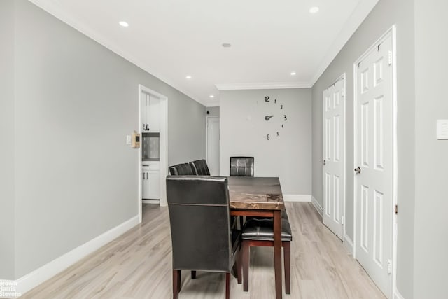 5639 Netherland Ave Unit 5C, New York City, NY 10471 - dining area with light wood finished floors, ornamental molding, and recessed lighting