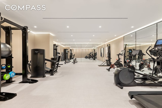 workout area featuring recessed lighting and carpet flooring