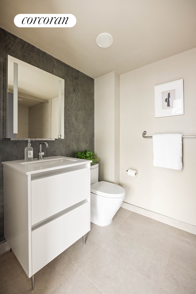 123 Clinton Ave Unit 4B, New York City, NY 11205 - bathroom featuring tile patterned flooring, vanity, and toilet
