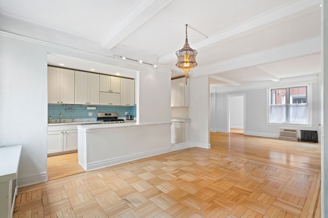 345 W 55th St Unit 9-Gh, New York City, NY 10019 - kitchen with stainless steel range, beam ceiling, light countertops, backsplash, and an AC wall unit