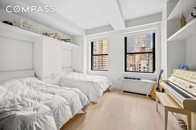 20 Pine St Unit 1201, New York City, NY 10005 - bedroom with light wood finished floors and baseboards