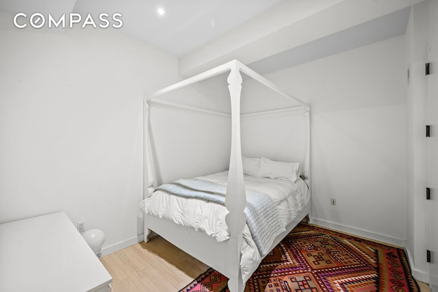 20 Pine St Unit 1201, New York City, NY 10005 - bedroom with light wood-type flooring and baseboards