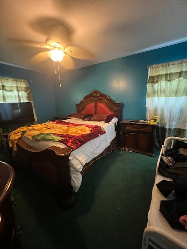 10567 Flatlands 7th St, New York City, NY 11236 - carpeted bedroom featuring a ceiling fan