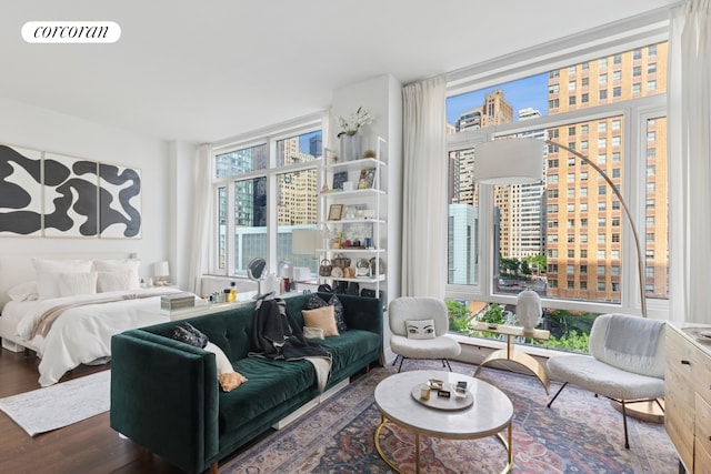 70 Little W St Unit 6J, New York City, NY 10280 - bedroom with wood finished floors and a city view