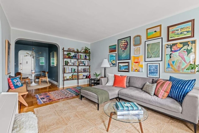 living room with arched walkways