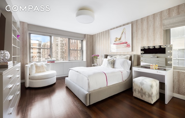 45 E 72nd St Unit 9Bc, New York City, NY 10021 - bedroom featuring wallpapered walls and dark wood finished floors