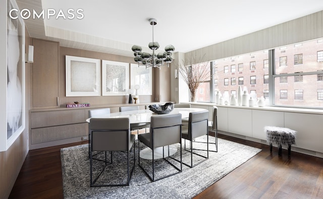 45 E 72nd St Unit 9Bc, New York City, NY 10021 - dining area featuring a chandelier and dark wood-style flooring