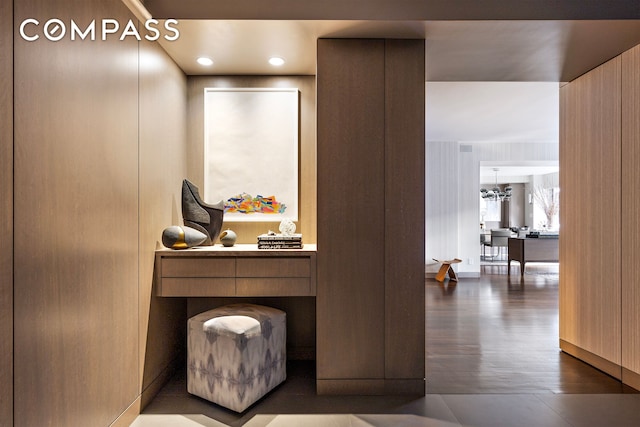 45 E 72nd St Unit 9Bc, New York City, NY 10021 - detailed view of wood finished floors and a chandelier