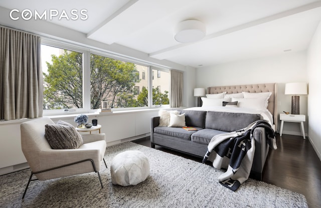 45 E 72nd St Unit 9Bc, New York City, NY 10021 - bedroom with wood finished floors, multiple windows, beam ceiling, and baseboards