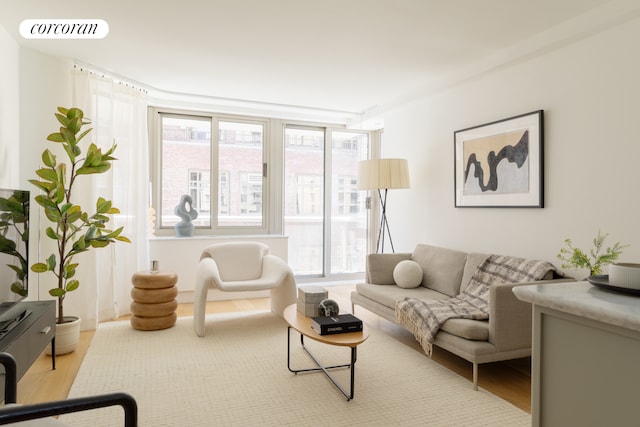 234 E 46th St Unit 701, New York City, NY 10017 - living area with wood finished floors