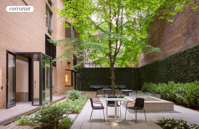 234 E 46th St Unit 701, New York City, NY 10017 - view of patio / terrace with outdoor dining space