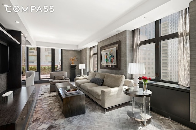 188 E 70th St Unit 10Cb, New York City, NY 10021 - living area with a wall of windows