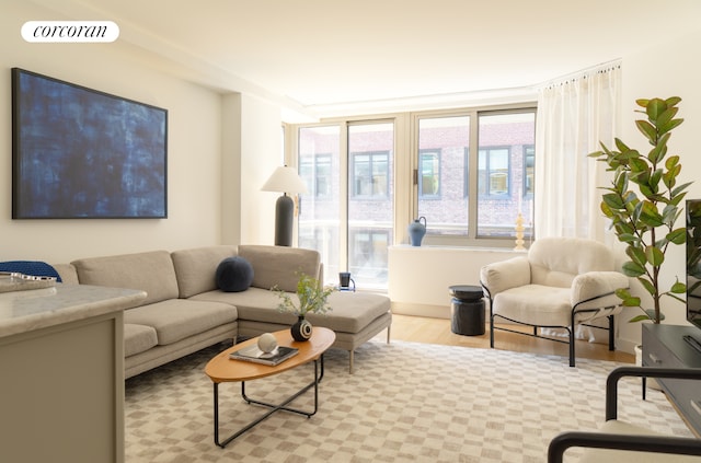 234 E 46th St Unit 1505, New York City, NY 10017 - living area featuring wood finished floors