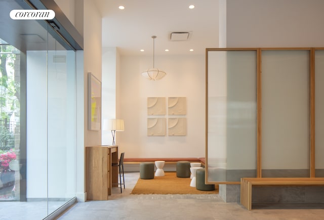 234 E 46th St Unit 1505, New York City, NY 10017 - building lobby featuring recessed lighting