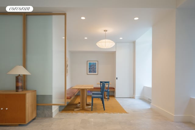 234 E 46th St Unit 1505, New York City, NY 10017 - dining room featuring recessed lighting and baseboards
