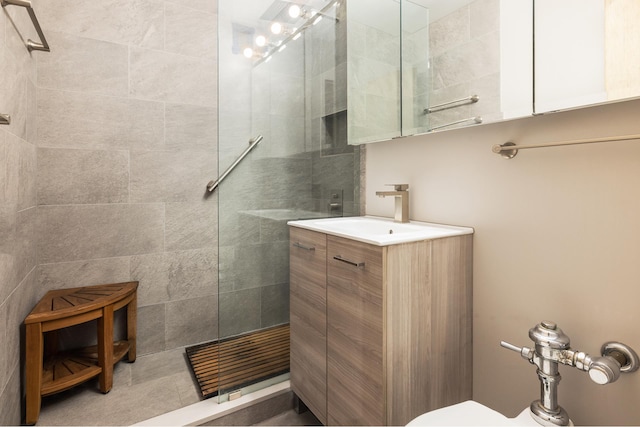 77 W 55th St Unit 7F, New York City, NY 10019 - bathroom featuring walk in shower and vanity