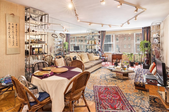 77 W 55th St Unit 7F, New York City, NY 10019 - dining space with rail lighting